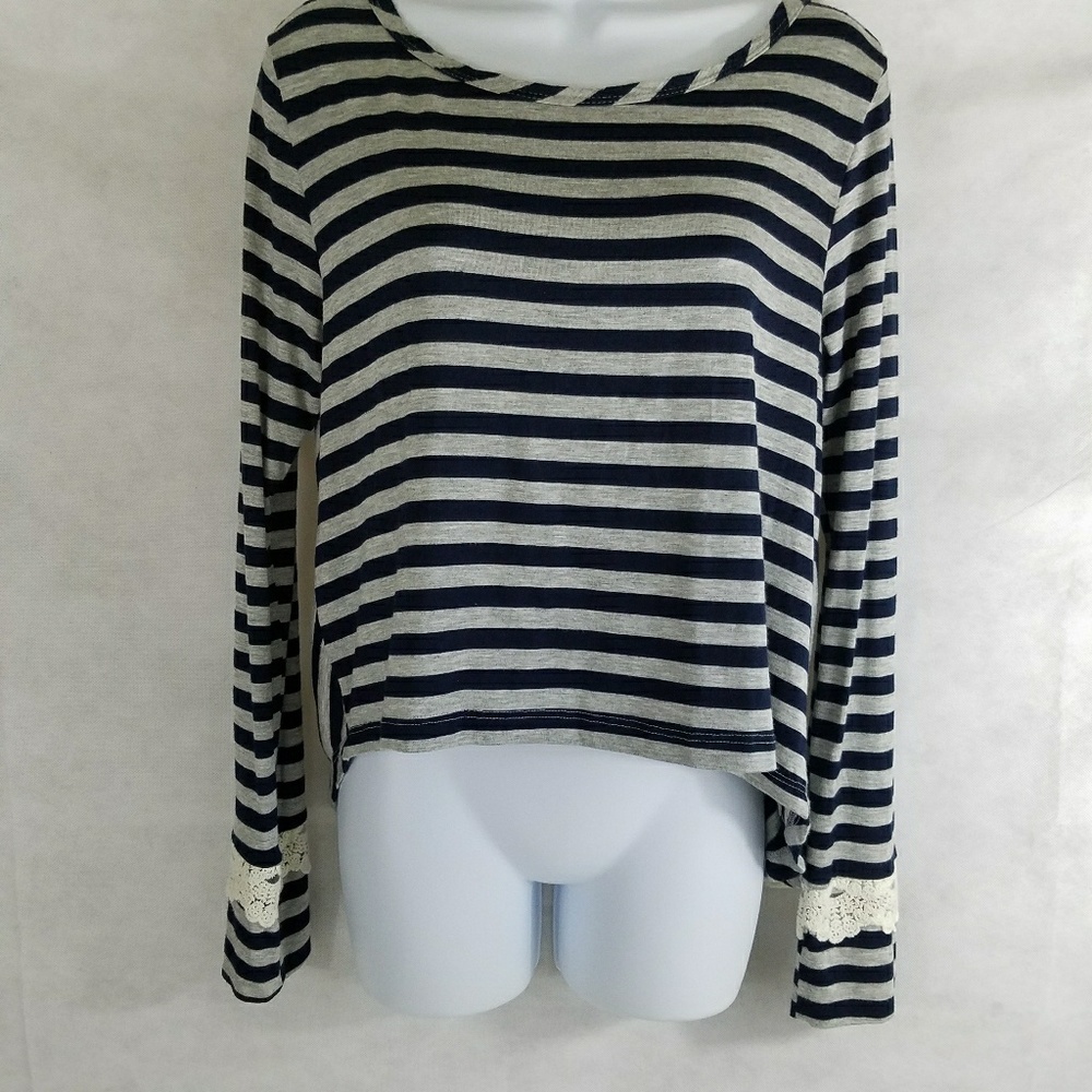 Clarity high low, open back top